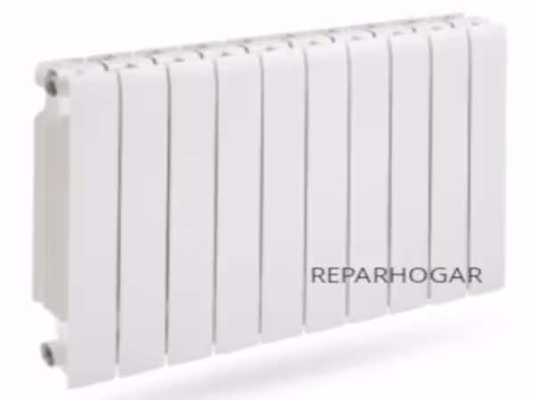 Radiador de aluminio Ferroli instalado en pared Radiador de aluminio Ferroli instalado por técnico de Reparhogar Barcelona
